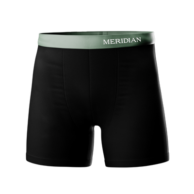 Black boxer briefs with a green waistband featuring the Meridian brand name.