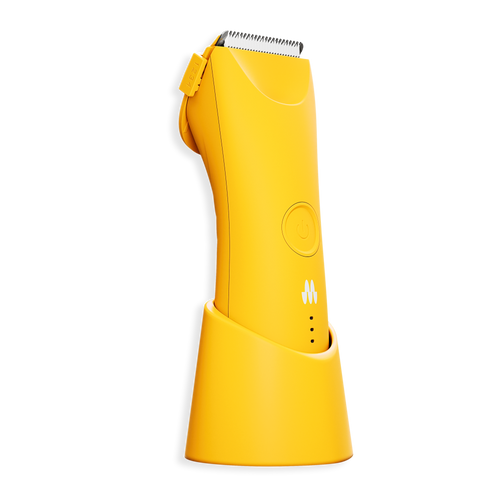 Yellow cordless electric hair clipper with adjustable blade, power button, LED indicators, and charging stand.